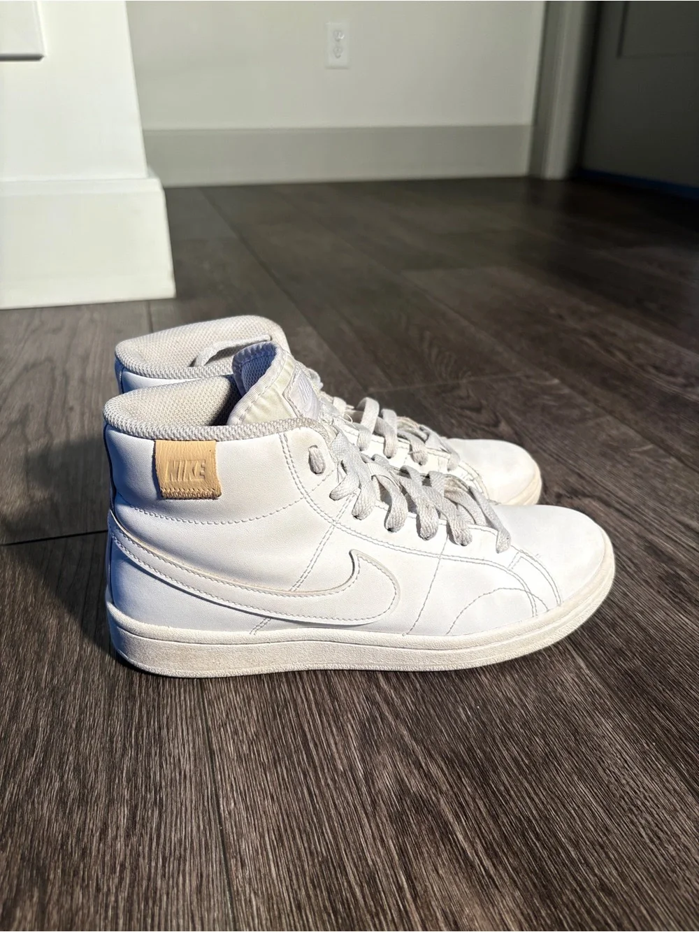 Nike White High-Top Sneakers with Tan Logo Patch